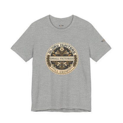 T‑Shirt — Vintage 'Glory Hunters: Small Victories Still Growing' Emblem