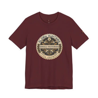 T‑Shirt — Vintage 'Glory Hunters: Small Victories Still Growing' Emblem